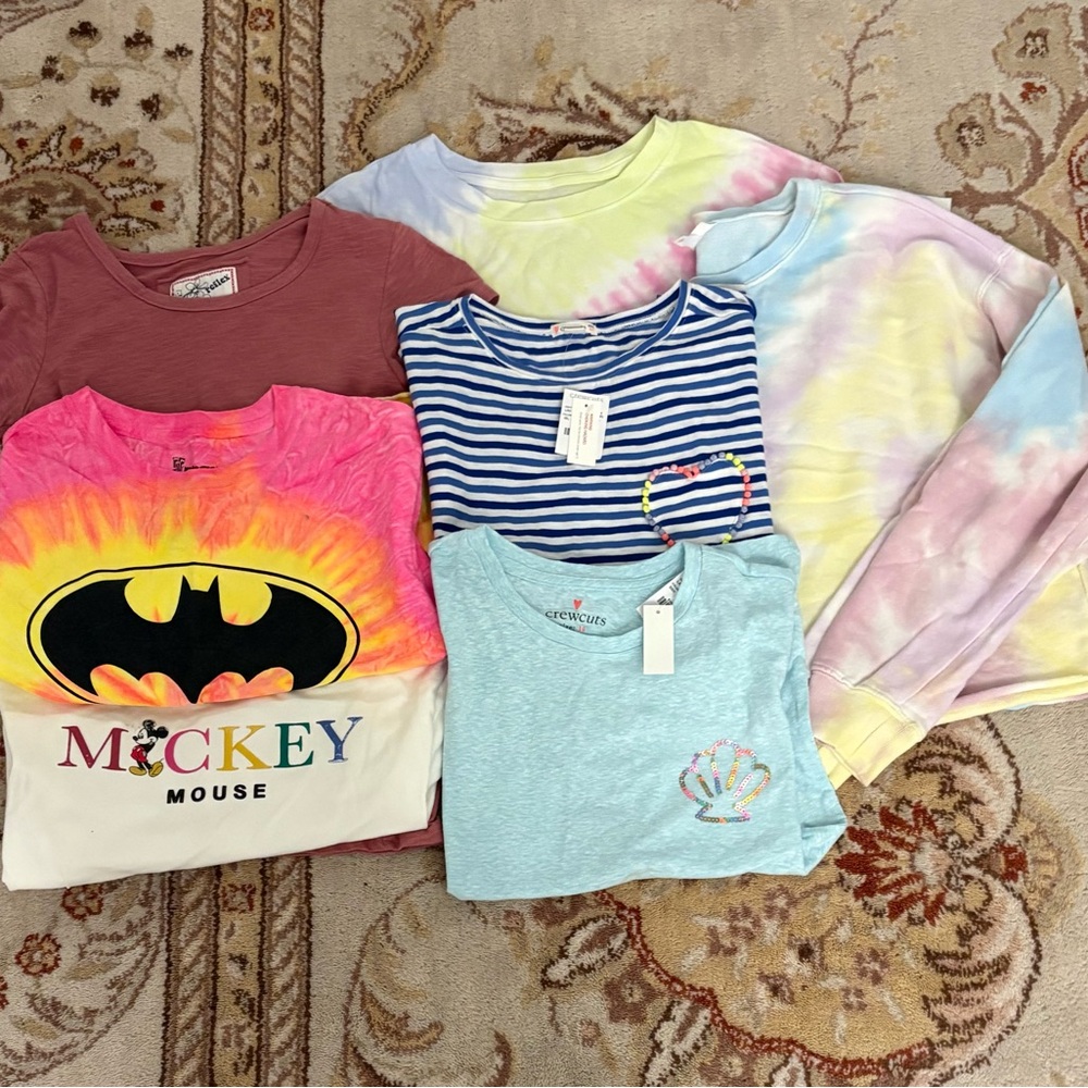 6 different t-shirts and 1 long sleeve